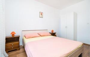 Posteľ alebo postele v izbe v ubytovaní Apartment Gruda Molunat Ii