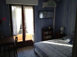 Postel nebo postele na pokoji v ubytování Appartement St Raphael