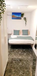 Ένα ή περισσότερα κρεβάτια σε δωμάτιο στο Loft Brisas del mar