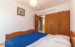 Posteľ alebo postele v izbe v ubytovaní Awesome Apartment In Novi Vinodolski