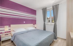 Ένα ή περισσότερα κρεβάτια σε δωμάτιο στο 1 Bedroom Beautiful Apartment In Baska +11 φωτογραφίες