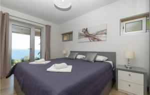 Posteľ alebo postele v izbe v ubytovaní Nice Home In Blato With House Sea View