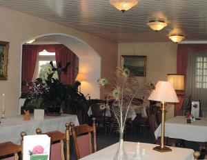 Un restaurante o sitio para comer en Hotel Villa Luise