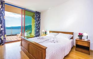 Postel nebo postele na pokoji v ubytování Gorgeous Home In Rijeka With Kitchen