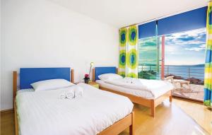 Postel nebo postele na pokoji v ubytování Gorgeous Home In Rijeka With Kitchen