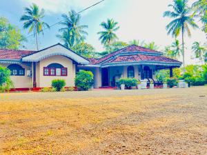 Κήπος έξω από το Gihan villa