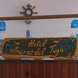 Et logo, certifikat, skilt eller en pris der bliver vist frem på Palmeras Del Tuyu