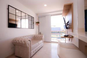 Μια τηλεόραση ή/και κέντρο ψυχαγωγίας στο Aptos Plaza Principal, con y sin Vista al Embalse, frente Autobús, a 8 minutos de la Piedra del Peñol, TODO CERCA!!!