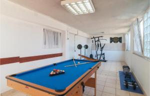 a billiard room with a pool table in it at 6 Bedroom Beautiful Home In Slatine in Slatine