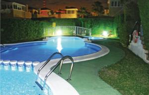 Bazén v ubytování Cozy Apartment In Guardamar Del Segura nebo v jeho okolí