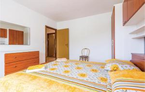 Ein Bett oder Betten in einem Zimmer der Unterkunft Amazing Home In Icici