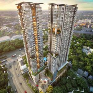 an overhead view of two tall buildings in a city at BeSS Mansion Hotel Surabaya in Wonocolo