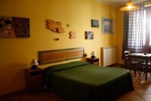 A bed or beds in a room at Le Storie di Bambu