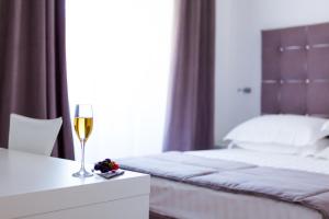 Posteľ alebo postele v izbe v ubytovaní Melody Suite Rome
