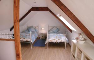 Postel nebo postele na pokoji v ubytování Holiday Home Le Faouet P-728