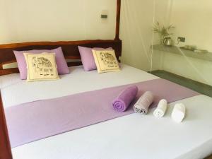 Letto o letti in una camera di Mango Tree House