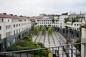 a view of a city street with buildings at P&P Piazza Bergamo Apartment in Bergamo