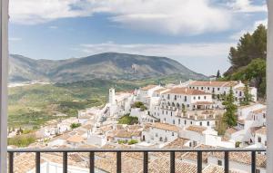 a view of a village with a mountain in the background at Gorgeous Home In Zahara De La Sierra in Zahara de la Sierra