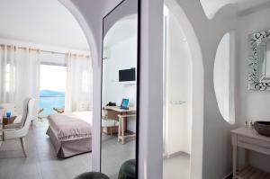 TV i/ili multimedijalni sistem u objektu Belvedere Suites