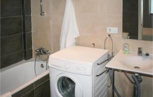 A bathroom at Nice Apartment In Casarones With Kitchen
