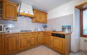O bucătărie sau chicinetă la Nice Home In Morosaglia With Kitchen