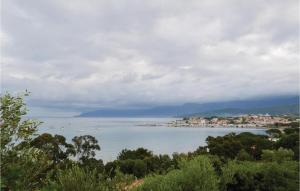 a view of a large body of water with boats in it at Lovely Home In Sant Petru Di Tenda in Santo-Pietro-di-Tenda
