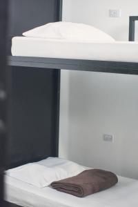 מיטה או מיטות בחדר ב-Casa Estación Hostal y Restaurante