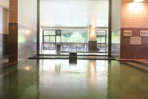 The swimming pool at or near Hotel Mahoroba