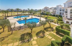 an aerial view of an apartment complex with a swimming pool at Gorgeous Apartment In Roldán With Wifi in Los Tomases