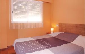 Posteľ alebo postele v izbe v ubytovaní Nice Apartment In Piles With Wifi