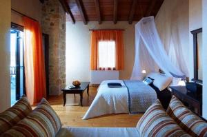 Postel nebo postele na pokoji v ubytování Agrielia Villa + 25 fotografií
