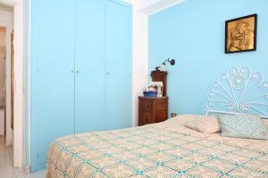A bed or beds in a room at Splendida Casa A Taormina " Casa di Anna "