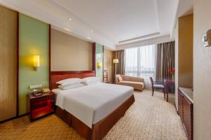 Postel nebo postele na pokoji v ubytování Park Plaza Changzhou, A member of Radisson Hotel&Resorts