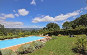 a swimming pool in the yard of a house at Stunning Home In Saignon in Saignon