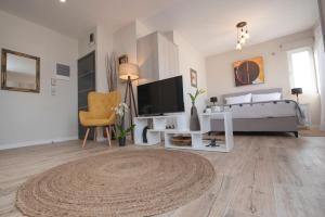 A television and/or entertainment centre at Chrysalis 2