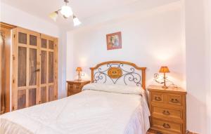 A bed or beds in a room at 8 Bedroom Lovely Home In Iznájar