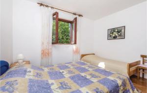 Postel nebo postele na pokoji v ubytování Cozy Apartment In Barbat-Rab With Wifi