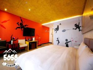 Postel nebo postele na pokoji v ubytování R8 Eco Hotel