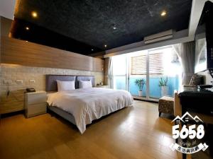 Postel nebo postele na pokoji v ubytování R8 Eco Hotel