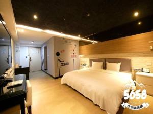 Postel nebo postele na pokoji v ubytování R8 Eco Hotel