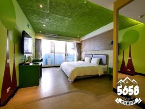 Postel nebo postele na pokoji v ubytování R8 Eco Hotel