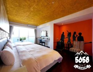 Postel nebo postele na pokoji v ubytování R8 Eco Hotel