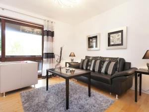 A seating area at Stylish apartment with indoor pool and infrared sauna in the Bavarian Forest