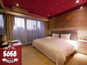 Postel nebo postele na pokoji v ubytování R8 Eco Hotel