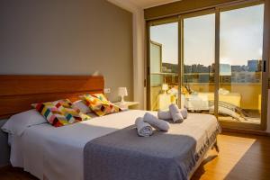Posteľ alebo postele v izbe v ubytovaní Cap Blanc Penthouse
