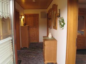a hallway of a house with a room with a door at Apartment in Langewiese near Winterberg in Winterberg