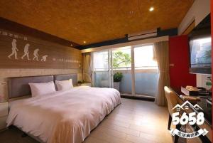 Postel nebo postele na pokoji v ubytování R8 Eco Hotel