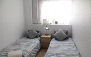 Posteľ alebo postele v izbe v ubytovaní Beautiful Apartment In Torrevieja