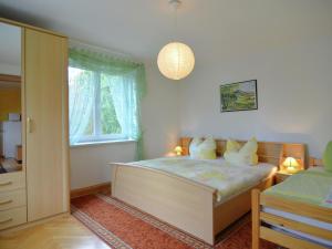 Posteľ alebo postele v izbe v ubytovaní Charming Apartment in Pockau with Swimming Pool