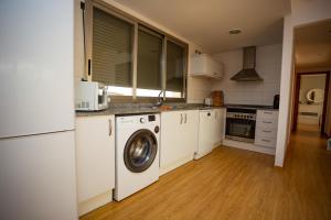 A kitchen or kitchenette at Cap Blanc Penthouse Cullera